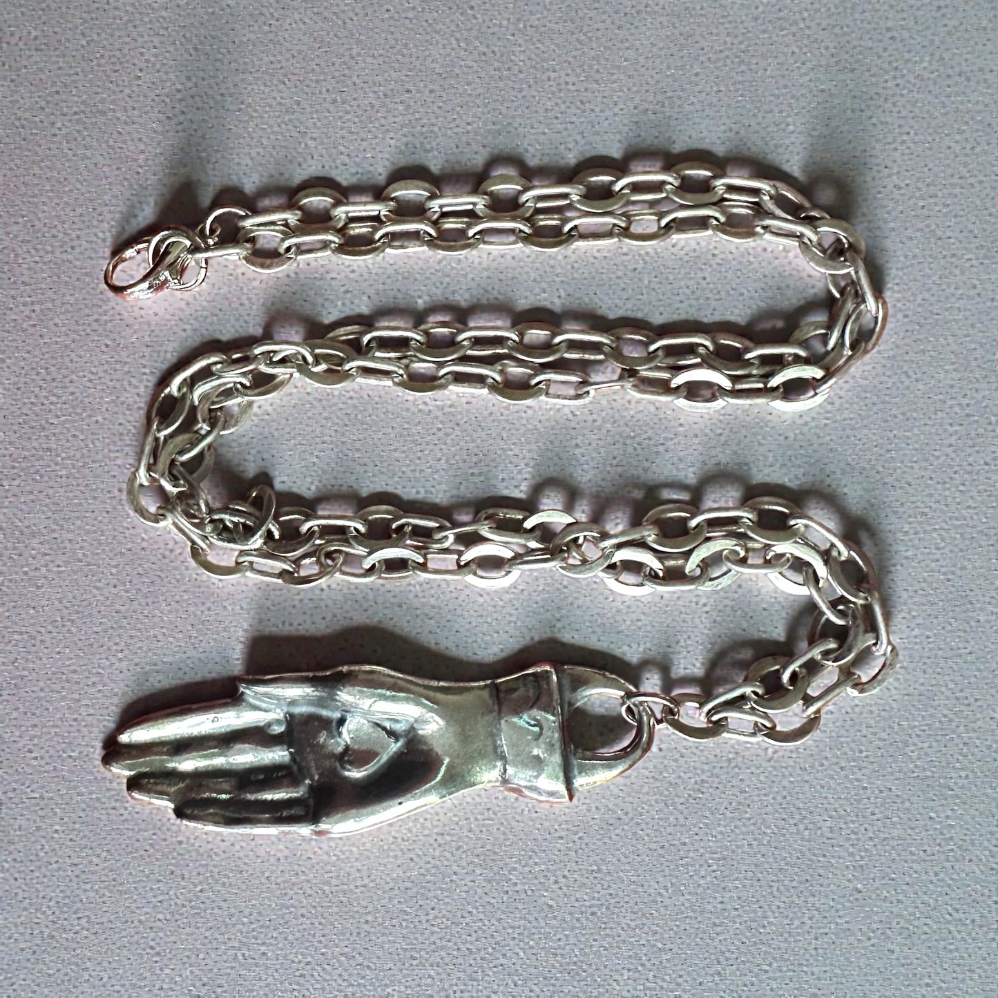 Love Offering Hand Necklace – Sterling Silver over Bronze