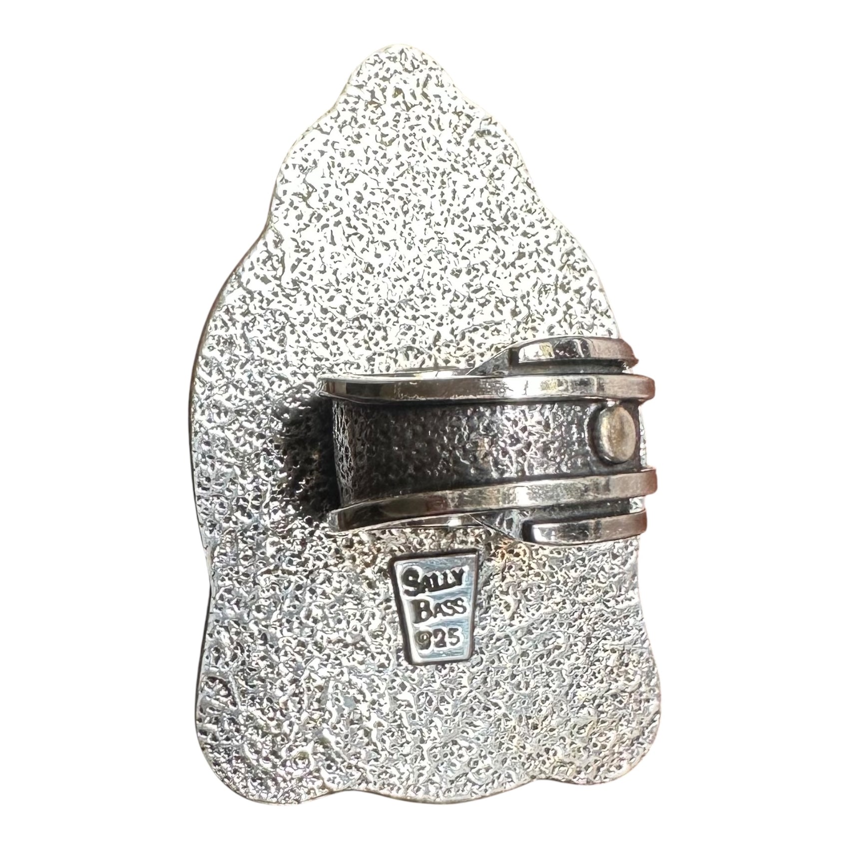 Sterling Silver Ring with carved Thai Buddha head design and richly textured ring back on a white background